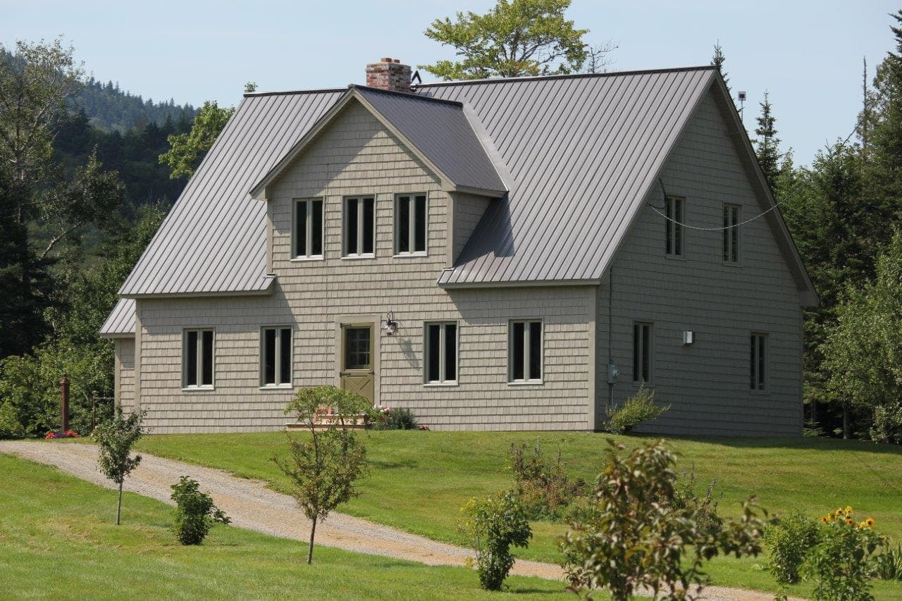 Farmhouse with standing seam metal roof