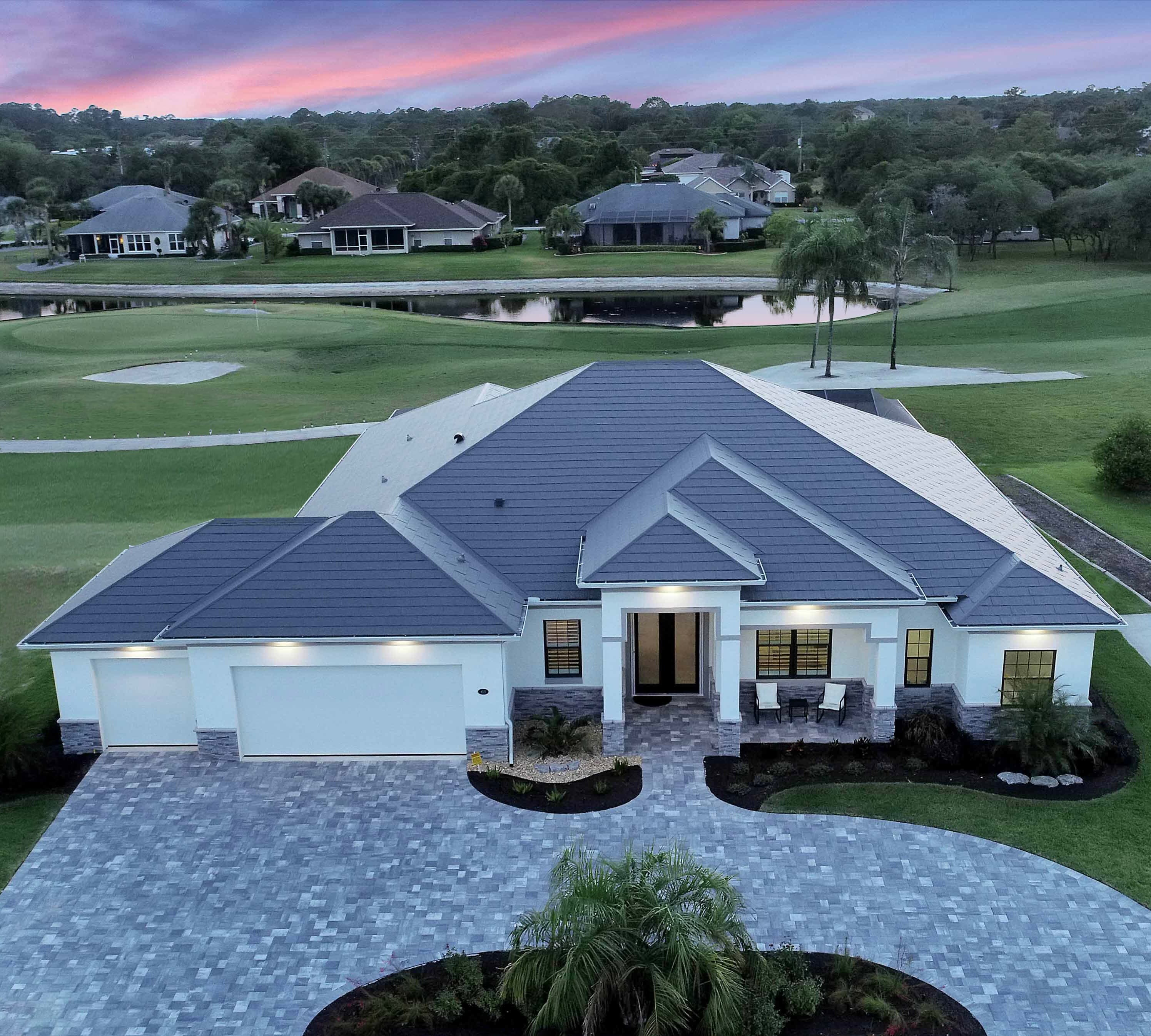 Metal shingle roof installation on a ranch-style home in Simcoe County